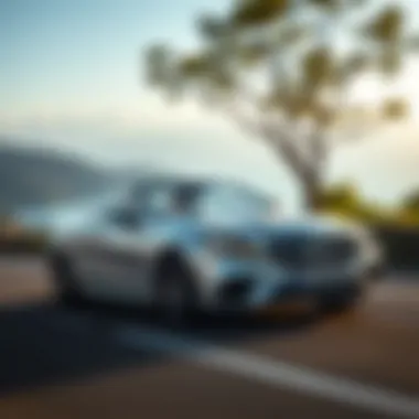 Performance in Motion: 2017 Benz Convertible Dynamic driving scene of the 2017 Benz Convertible on a scenic road illustrating its performance capabilities