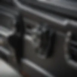 A close-up view of a car trunk latch mechanism showing intricate details.