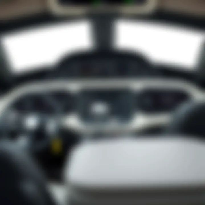 Detailed dashboard area of the Coachmen Leprechaun 220QB with modern controls and technology.