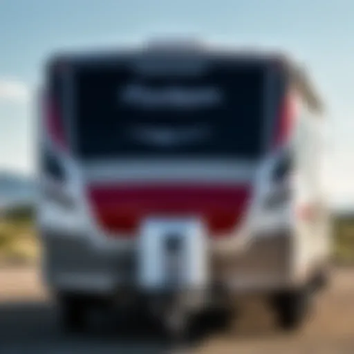 Exterior view of the Coachmen Leprechaun 220QB showcasing its sleek design and vibrant colors.