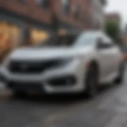 A pristine used Honda Civic parked in an urban environment